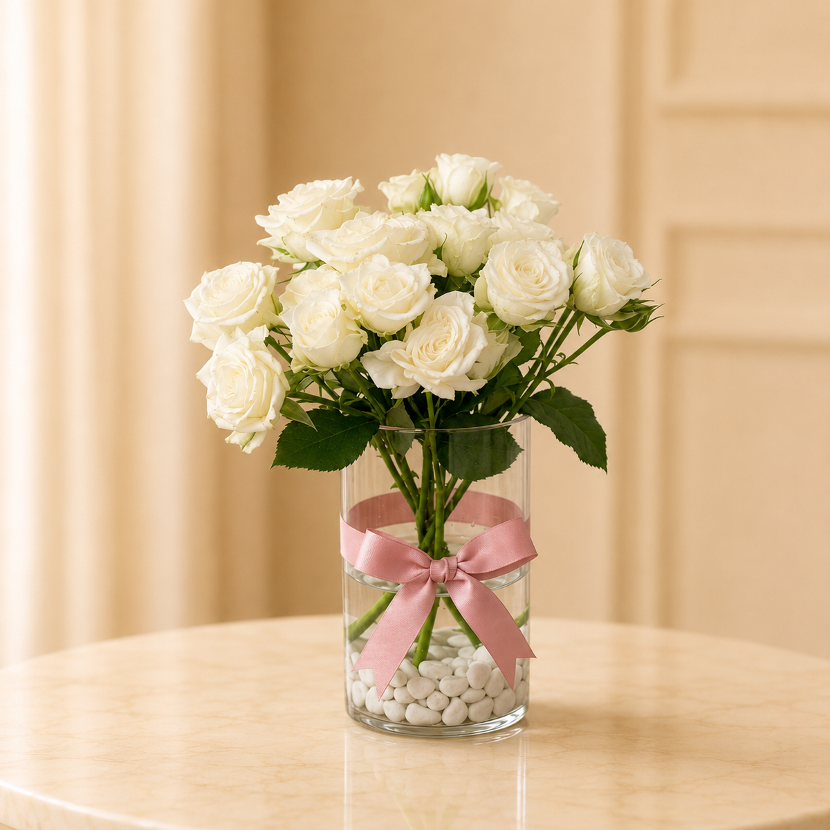 Ivory Blush Joury – white spray roses in a glass cylinder vase with pink ribbon
