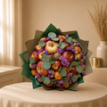 Orchard Harvest - fruit bouquet of red apples, orange apricots and walnuts with eucalyptus and purple statice in green and brown kraft paper