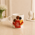 Sunlit Trio Mug - white ceramic mug sculpted with a mother in red lettered THE BEST MOM and two children