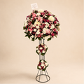 Blushing Delight Stand - three-tier pink rose, burgundy bloom, and white chrysanthemum standing arrangement with love card on clean beige background