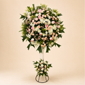 Grand Blush Stand - blush pink floral arrangement on elegant stand, clean beige background
