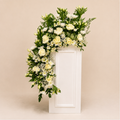 Pure Elegance Stand - ivory rose, white chrysanthemum, and alstroemeria standing arrangement on clean beige background