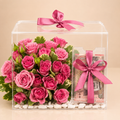 Rose Gift Box - Pink roses in a clear acrylic box with a pink satin bow and money gift compartment, clean beige background