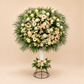 Timeless Grace Stand - ivory rose, peach spray rose, and palm foliage standing arrangement on clean beige background